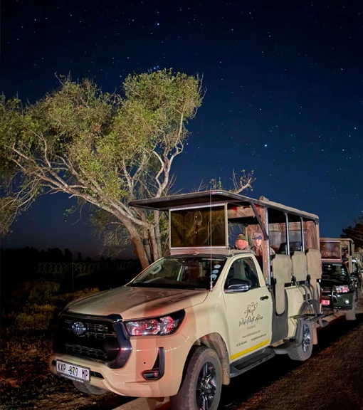 Clients going on Kruger National Park safari in an open safari vehicle